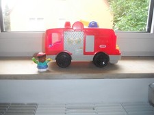 Feuerwehrauto von Fisher Price mit einer Figur, gebraucht