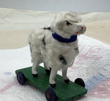 Wollschafe Schaf  auf Rollbrett  Spielzeug