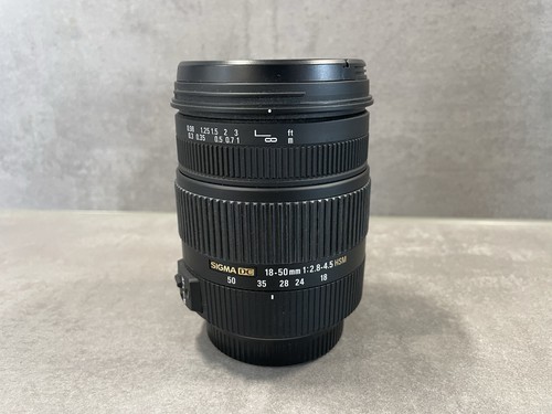 Sigma 50mm 5 dc - 18-50mm,