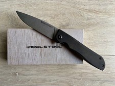 real steel Megalodon Fossil,Micarta schwarz in OVP.