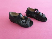 Finn Sandalen, Schwarz