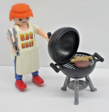 Grill Meister + Mann mit Grill