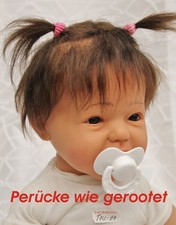 Baby-Perücke wie gerootet