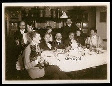 Man with Dog on Lap at Dining