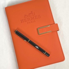 Hermes Orange Notebook with
