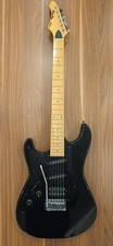 Mad Axe by Aria Pro II, Linkshänder E-Gitarre, Stratocaster in schwarz, Vintage 