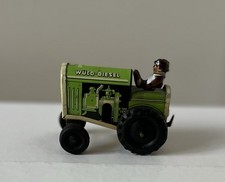 Grüner Traktor WÜCO -Diesel 480 mit Fahrer  - Blechspielzeug