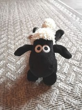 Shaun das schaf liegend - schaf, 🐑