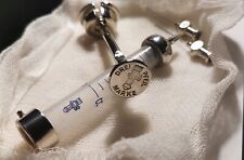 Alte Spritze der Marke Drei-Pfeil mit 2 Acufirm Nadeln V2A Gr. 18 