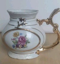 Porzellan Tasse mit Henkel aus