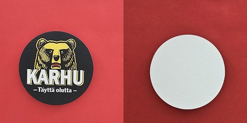 Karhu täyttä olutta - karhu,