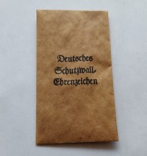 Verleihungstüte zum Deutschen Schutzwall Ehrenzeichen