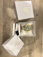 Eleganz in Gold - GUESS