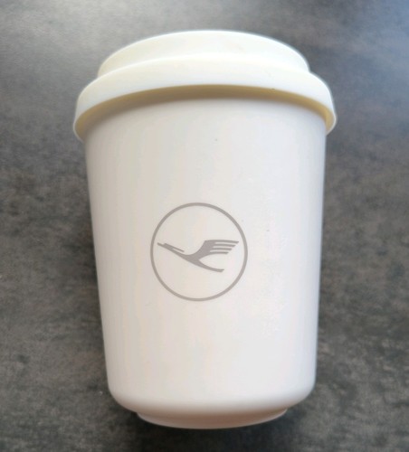 Lufthansa first business - &,