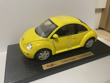 Volkswagen New Beetle in gelb von Maisto Modellauto 1/18 mit OVP