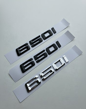 650i Emblem Schwarz Glanz /