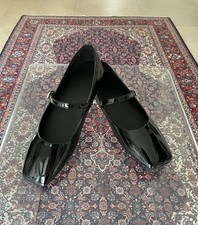Schwarze flache Lackschuhe
