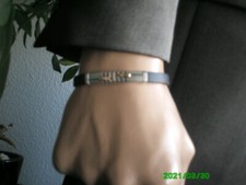 Schönes Kautschukarmband mit Edelstahl-teilvergoldet Unisex ,verstellbar 