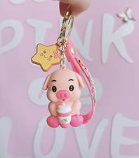 Süßer rosa Ferkel hält