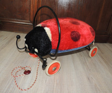 Steif-Marienkäfer-Sitz und Ziehtier um 1950/60