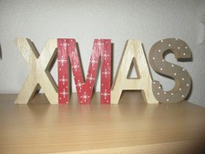 XMas Schriftzug  in Holz, ca. 40 x 14,5 cm.