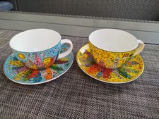 2er Set James Rizzi Pop Art Tassen mit Untertasse  blau + gelb Goebel