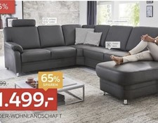 Große schwarze Leder-Eckcouch