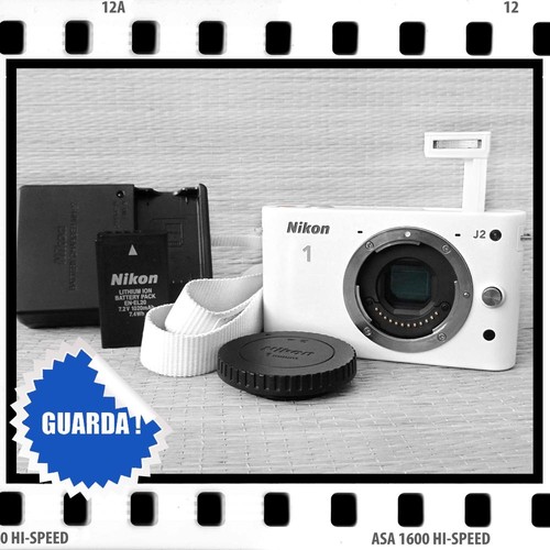 Nikon kompaktes - 1,
