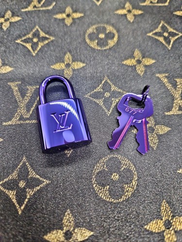 Original louis vuitton charm - louis,