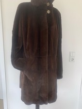 Luxuriöser Nerzmantel, Saga