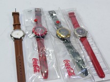 4 Stück Coca Cola Armbanduhren, verschd. Neu