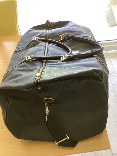Schwarze leder reisetasche - schwarze,