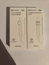 Zwei Olight Beads in Titan und