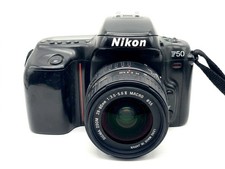 Nikon F50 + Sigma 28-80mm