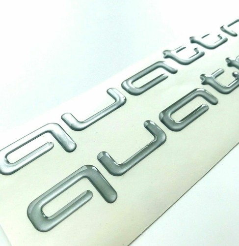 Quattro logo vorne - vorne, hinten