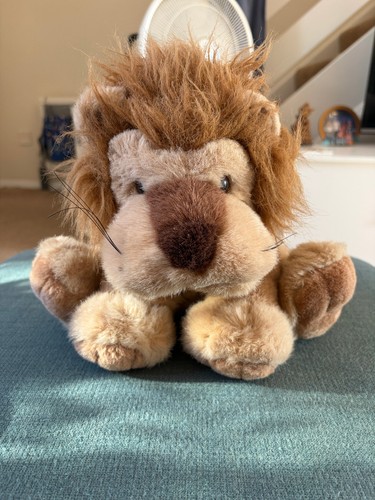 Sitzender löwe von animal - sitzender,