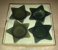 4 alte, grüne Teelichthalter in Sternform