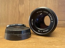 Fast Neu Nikon Serie E 100mm