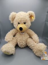 Steiff 674495 - Teddybär Fynn ca. 38 cm groß - Knopf, Fahne, Schild und Etikett