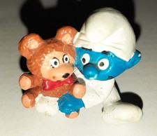 20205 Baby Schlumpf mit Teddy