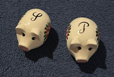 2 kleine Porzellanschweinchen