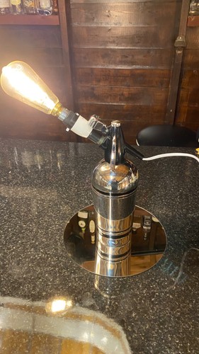 Cycled vintage soda syphon - up,