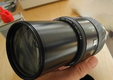 Minolta 100–300mm AF Teleobjektiv -1:4.5(32)-5.6 orig. Streulinse .OVP.