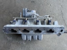 Ansaugbrücke mit Vergaser