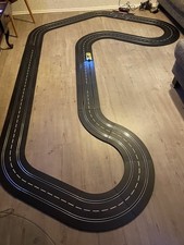 Carrera Digital 132/124 gebraucht mit einem  Auto