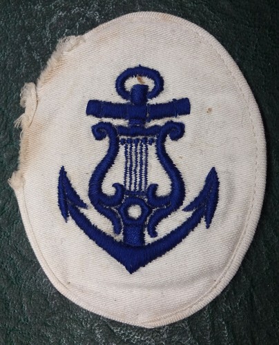 Original navy badge for - km,