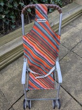 Vintage 70er Cindico Kinder Spielzeug Kinderwagen Buggy orange braun gestreift