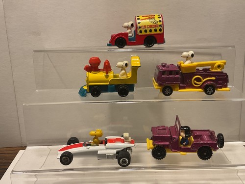 Peanuts figur im auto - x,