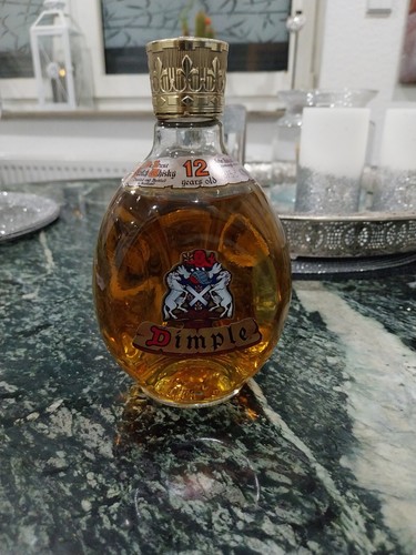 Dimple deluxe scotch whisky - scotch, 12