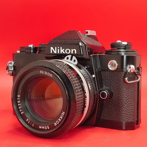 Fast neuwertig nikon fe - +",
